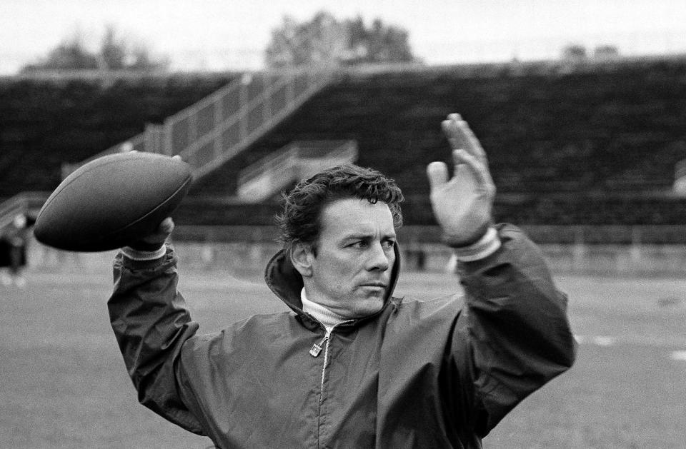 Len Dawson of the Kansas City Chiefs runs through passing drills with receivers, Jan. 10, 1970, in New Orleans to prepare for the Super Bowl IV.