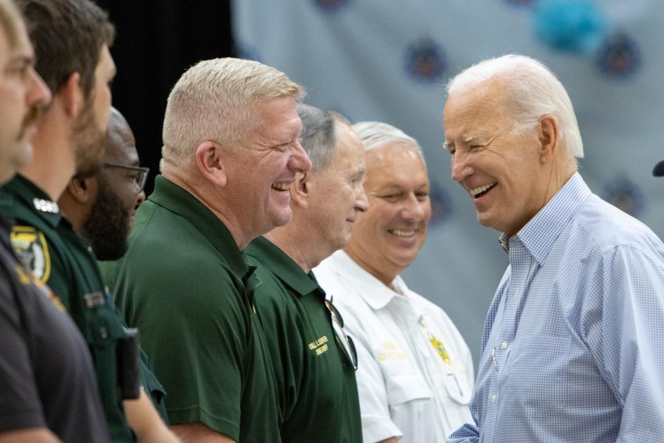 Mayor of Live Oak, Frank Davis, talks to President Joe Biden on Saturday, Sept. 2, 2023. The President and the first lady visited Live Oak, Florida, to meet community members and see damage from Hurricane Idalia.
