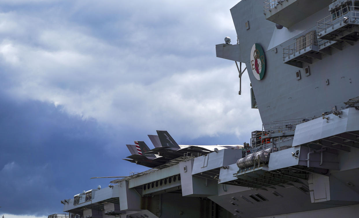 HMS Queen Elizabeth at HM Naval Base, Portsmouth, ahead of the ship's maiden deployment to lead the UK Carrier Strike Group on a 28-week operational deployment travelling over 26,000 nautical miles from the Mediterranean to the Philippine Sea. Picture date: Saturday May 22, 2021. (Photo by Steve Parsons/PA Images via Getty Images)