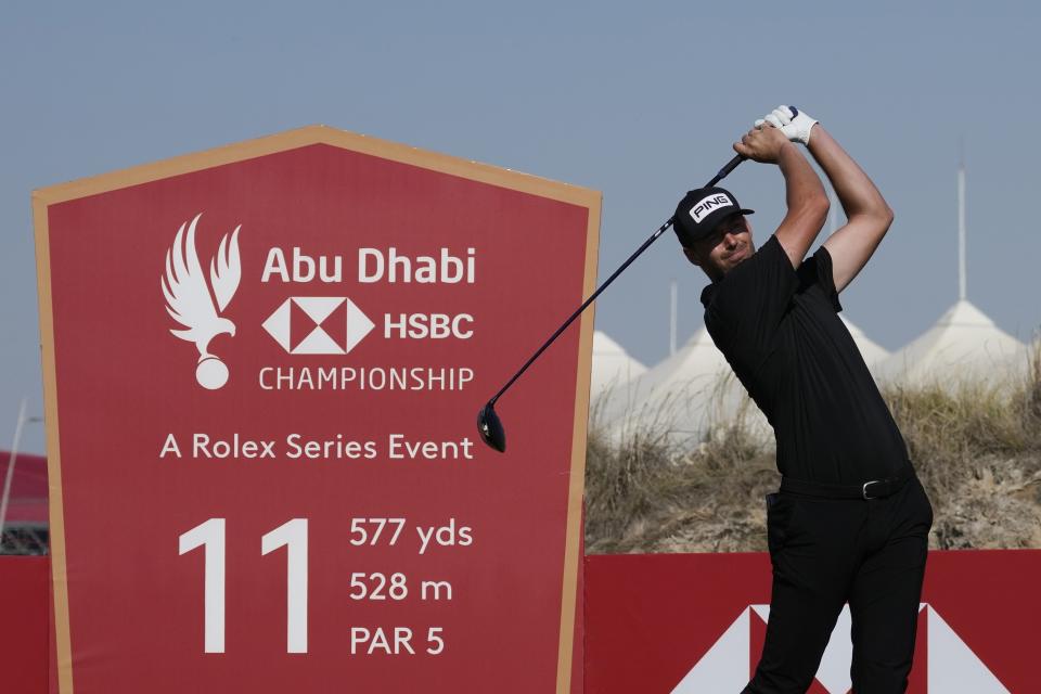 Victor Perez of France tees off on the 11th hole during the final round of Abu Dhabi HSBC Golf Championship, in Abu Dhabi, United Arab Emirates, Sunday, Jan. 22, 2023. (AP Photo/Kamran Jebreili)