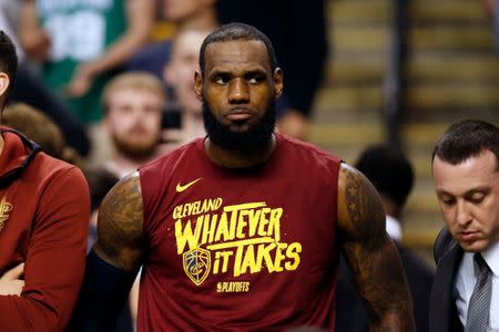 May 15, 2018; Boston, MA, USA; Cleveland Cavaliers forward LeBron James (23) watches the end of the fourth quarter against the Boston Celtics in game two of the Eastern conference finals of the 2018 NBA Playoffs at TD Garden. Mandatory Credit: Greg M. Cooper-USA TODAY Sports