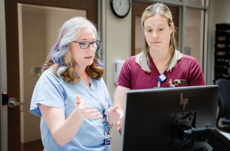 Dr Francesca Turner, left, an OBGYN at Broadlawns goes over a patients chart with Dr. Kiara Festing-Smith, an OB Fellow, Monday, Aug. 7, 2023.