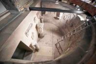 Experts open the ossuary at the Teutonic Cemetery at the Vatican