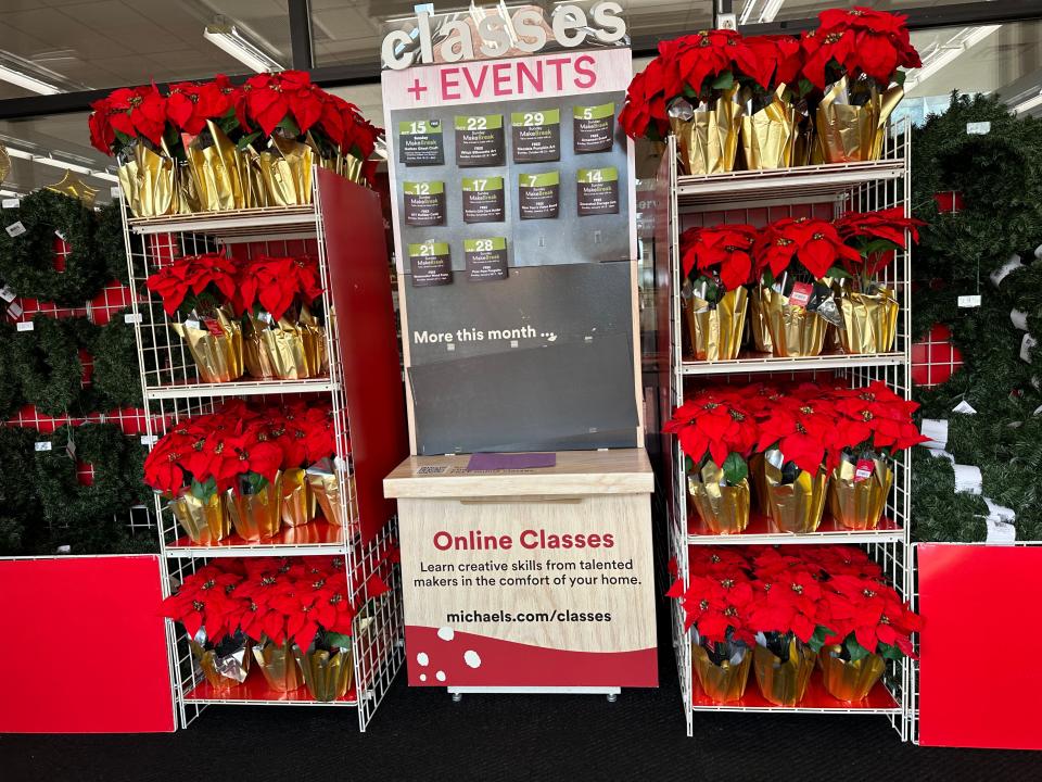 Poinsettia display in entrance of Michaels