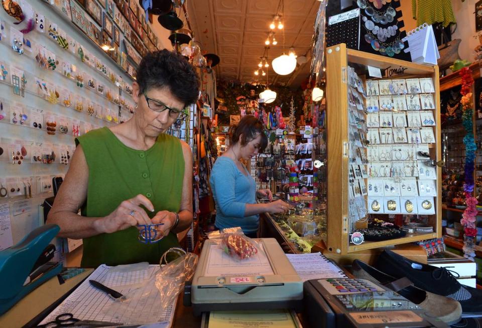 Carol Anderson, left, is owner of Vaguely Reminiscent, a clothing store on Ninth Street in Durham.