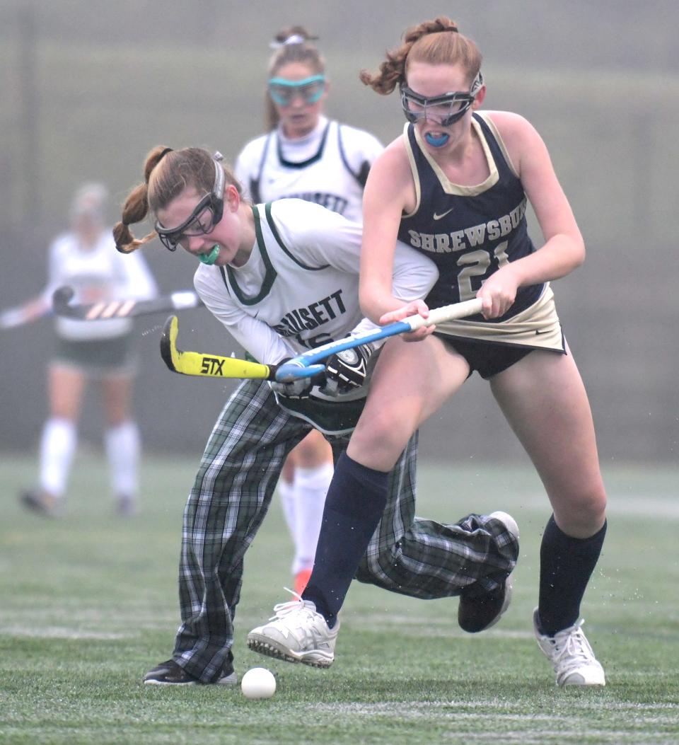 Wachusett's Kate Louder battles Shrewsbury's Olivia Connolly, right, for control of a loose ball during a game last season.