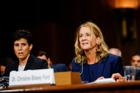 Christine Blasey Ford, with lawyer Debra S. Katz, left, answers questions at a Senate Judiciary Committee hearing on Thursday, September 27, 2018 on Capitol Hill. Melina Mara/Pool via REUTERS