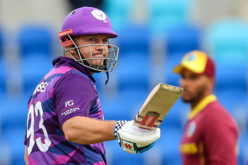 Seen here, Scotland's George Munsey salutes fans after scoring a fifty against the West Indies at the T20 World Cup in Hobart. 