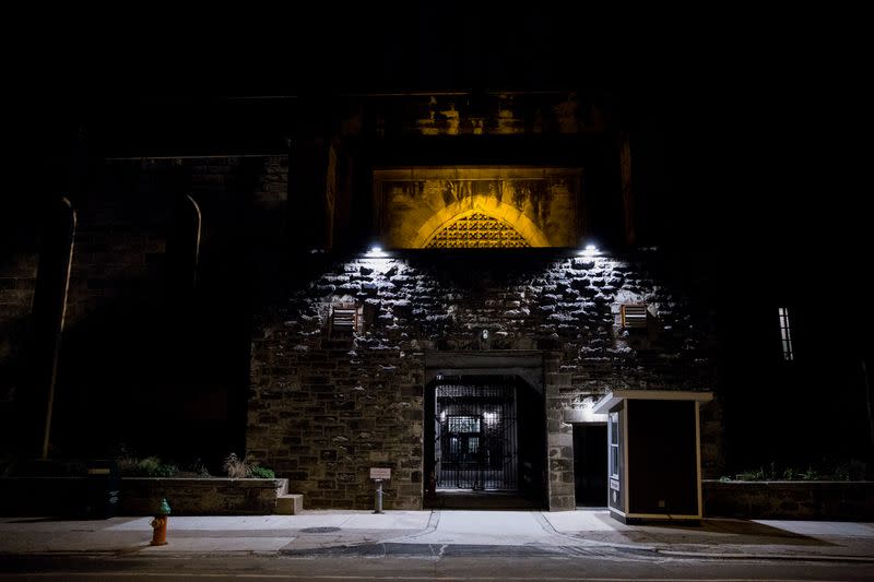 The Eastern State Penitentiary, a ballot drop box location for the upcoming presidential election, is illuminated at night in Philadelphia, Pennsylvania