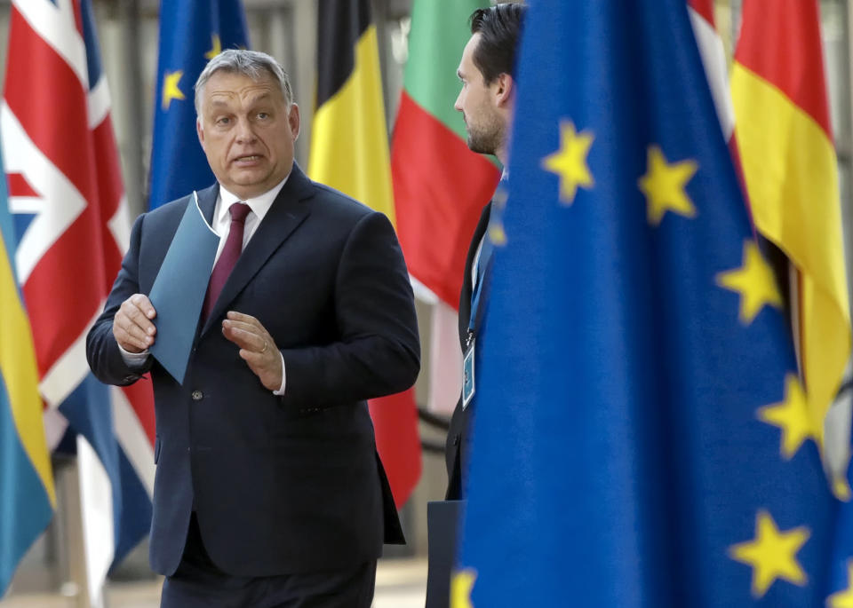 FILE - In this Thursday, June 28, 2018 file photo, Hungarian Prime Minister Viktor Orban arrives for an EU summit at the Europa building in Brussels, Belgium. As the Hungarian prime minister’s conflicts with the European Union appear headed to a breaking point, calls are increasing for greater scrutiny of his government’s spending of EU funds. An opposition lawmaker in Hungary has gathered over 470,000 signatures to pressure Prime Minister Viktor Orban into joining the budding European Public Prosecutor’s Office as Orban’s Fidesz party may be suspended or expelled next week from the main center-right group in the European Parliament, it was announced Thursday, March 14, 2019.(AP Photo/Olivier Matthys, File)