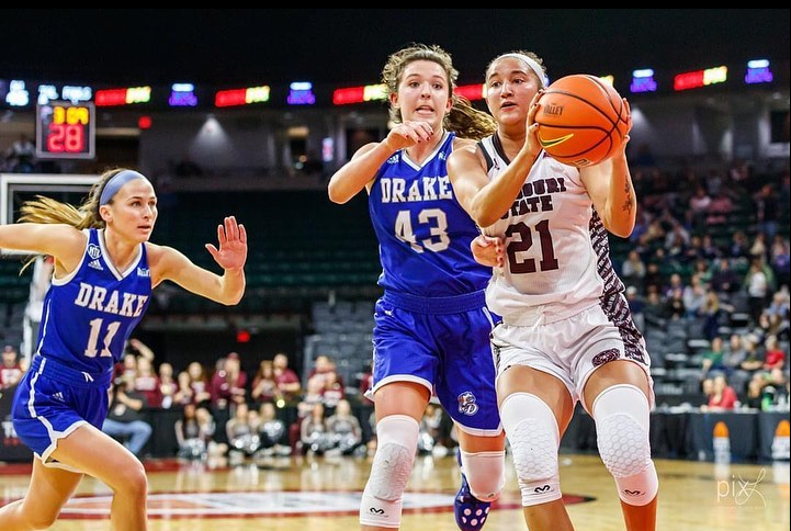 Action during the 2022 women’s basketball tournament at The MARK in Moline.