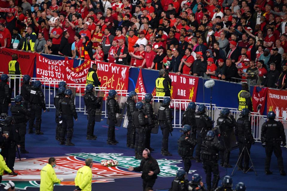 Police stand in front of Liverpool fans during the Champions League final at the Stade de France (Peter Byrne/PA) (PA Wire)