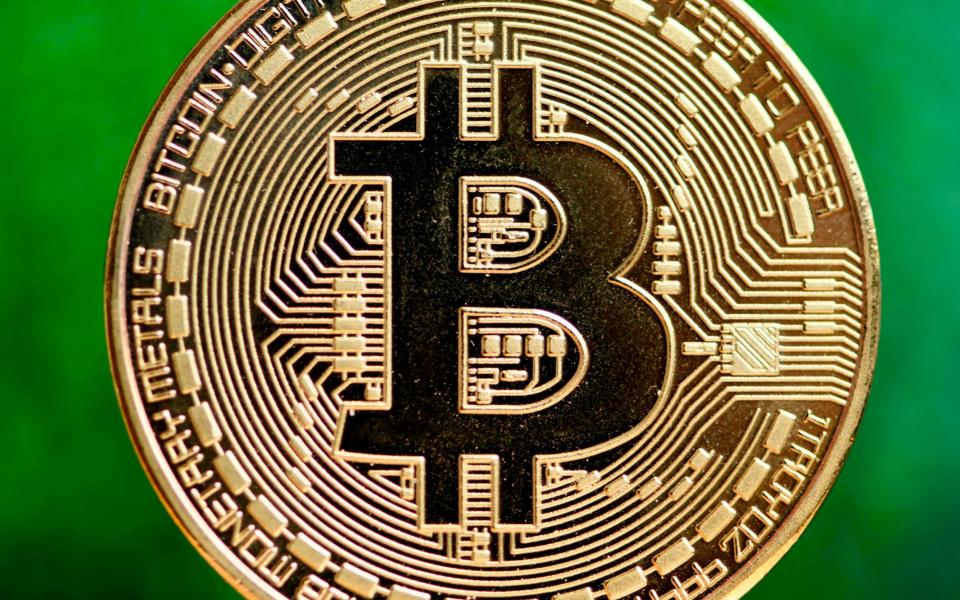 How to add Bitcoin to your Isa and profit tax-free - INA FASSBENDER/AFP