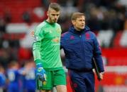 Britain Football Soccer - Manchester United v Leicester City - Barclays Premier League - Old Trafford - 1/5/16 Manchester United's David De Gea and goalkeeping coach Frans Hoek at the end of the match Action Images via Reuters / Jason Cairnduff Livepic