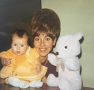 <p>Ripa also showed some love for her mom, Esther, with a throwback from 1970. “Happy Mother’s Day mom! Not sure how you did it, but you balanced me and your wig and the same time and made it look easy!” she quipped. “I love you.” (Photo: <a rel="nofollow noopener" href="https://www.instagram.com/p/BUE3sHWjZqh/" target="_blank" data-ylk="slk:Kelly Ripa via Instagram;elm:context_link;itc:0;sec:content-canvas" class="link ">Kelly Ripa via Instagram</a>) </p>