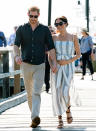 <p>The couple looked blissfully in love as they held hands and strolled along the jetty. Photo: Getty Images </p>