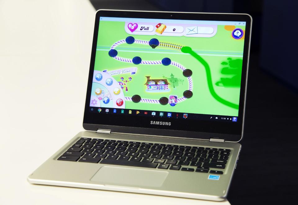 In this Feb. 8, 2017, photo, a Google Chromebook displays Candy Crush Saga in New York. Google Chromebook laptops are impractical for many people because they’re little more than expensive paperweights when they’re out of range of an internet connection. Yet they’ve defied expectations and made tremendous inroads in one of the least likely places: U.S. schools. (AP Photo/Mark Lennihan)