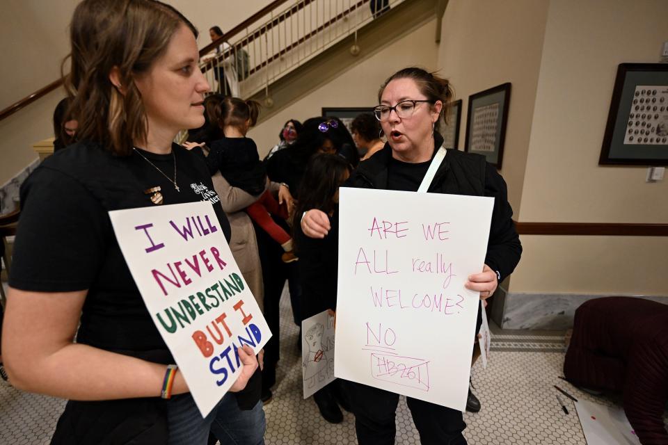 Anne Pimentel and Briawna Hugh talk as they attend a protest outside the hearing room prior to Senate members of the Education Standing Committee hearing comments on HB261 at the Capitol in Salt Lake City on Monday, Jan. 22, 2024. The bill received a favorable recommendation. | Scott G Winterton, Deseret News