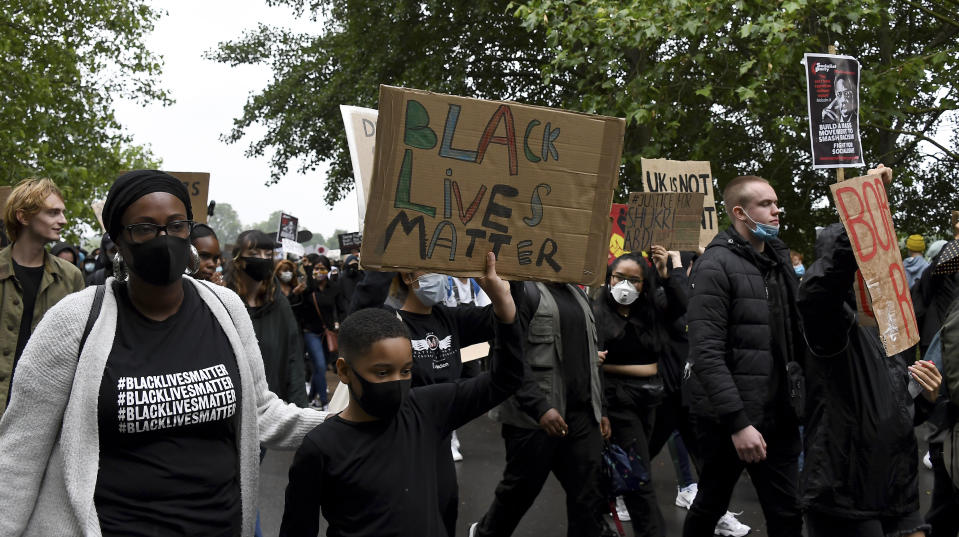 Black Lives Matter protestors march from Hyde Park during protests in London, Friday, June 12, 2020 in response to the recent killing of George Floyd by police officers in Minneapolis, USA, that has led to protests in many countries and across the US.(AP Photo/Alberto Pezzali)