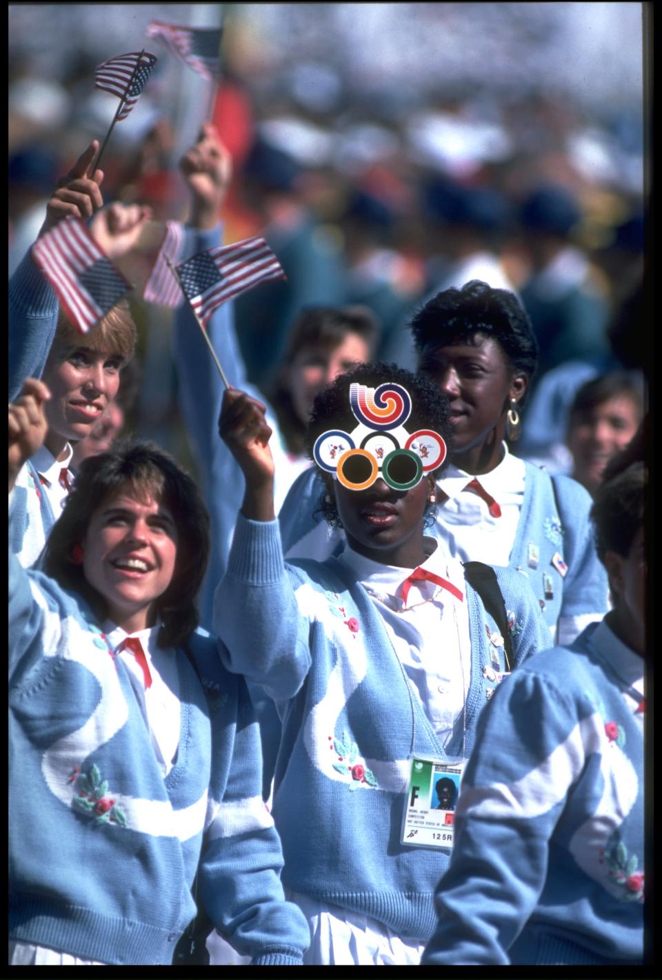 16 SEP 1988: THE TEAM FROM THE UNITED STATES ARE PHOTOGRAPHED WAVING THE FLAG AND ENJOYING THEMSELVES AT THE OPENING CEREMONY OF THE 1988 SUMMER OLYMPICS HELD IN SEOUL.