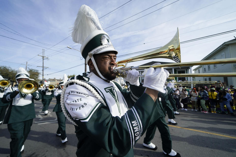 Members of the Mississippi Valley State University Marching Band performs during the traditional Krewe of Zulu Parade on Mardi Gras Day in New Orleans, Tuesday, Feb. 21, 2023. (AP Photo/Gerald Herbert)