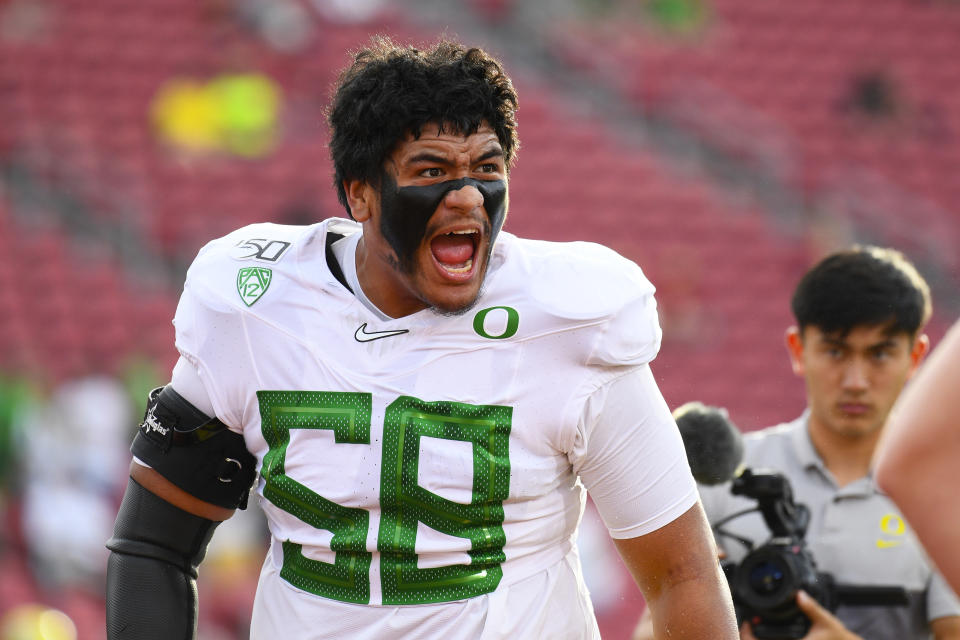 Oregon OT Penei Sewell possesses as much potential as any left tackle to come along the past few years. (Photo by Brian Rothmuller/Icon Sportswire via Getty Images)