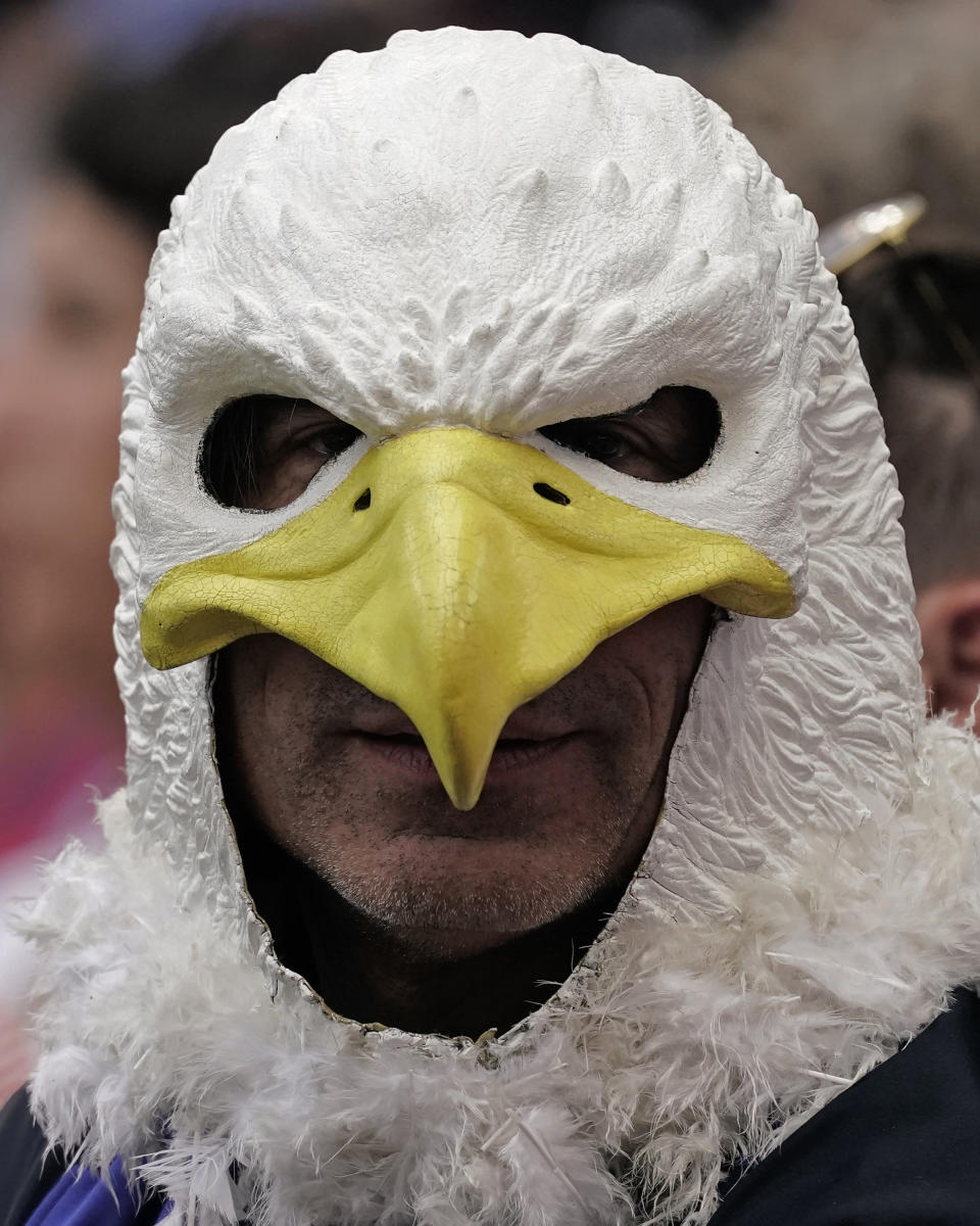 A fan watch watchers during the first half of an international friendly soccer match between USA and Uruguay Sunday, June 5, 2022, in Kansas City, Kan. (AP Photo/Charlie Riedel)