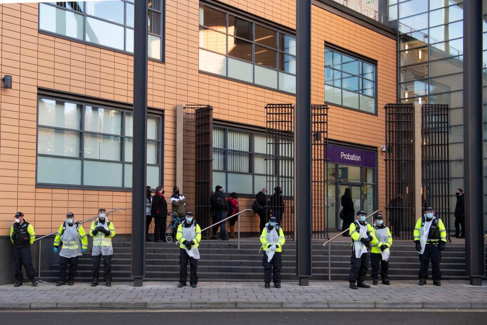 Police line up outside Bristol Magistrates’ Court ahead of the 'The Colston 4’ court appearance on MondayGetty Images