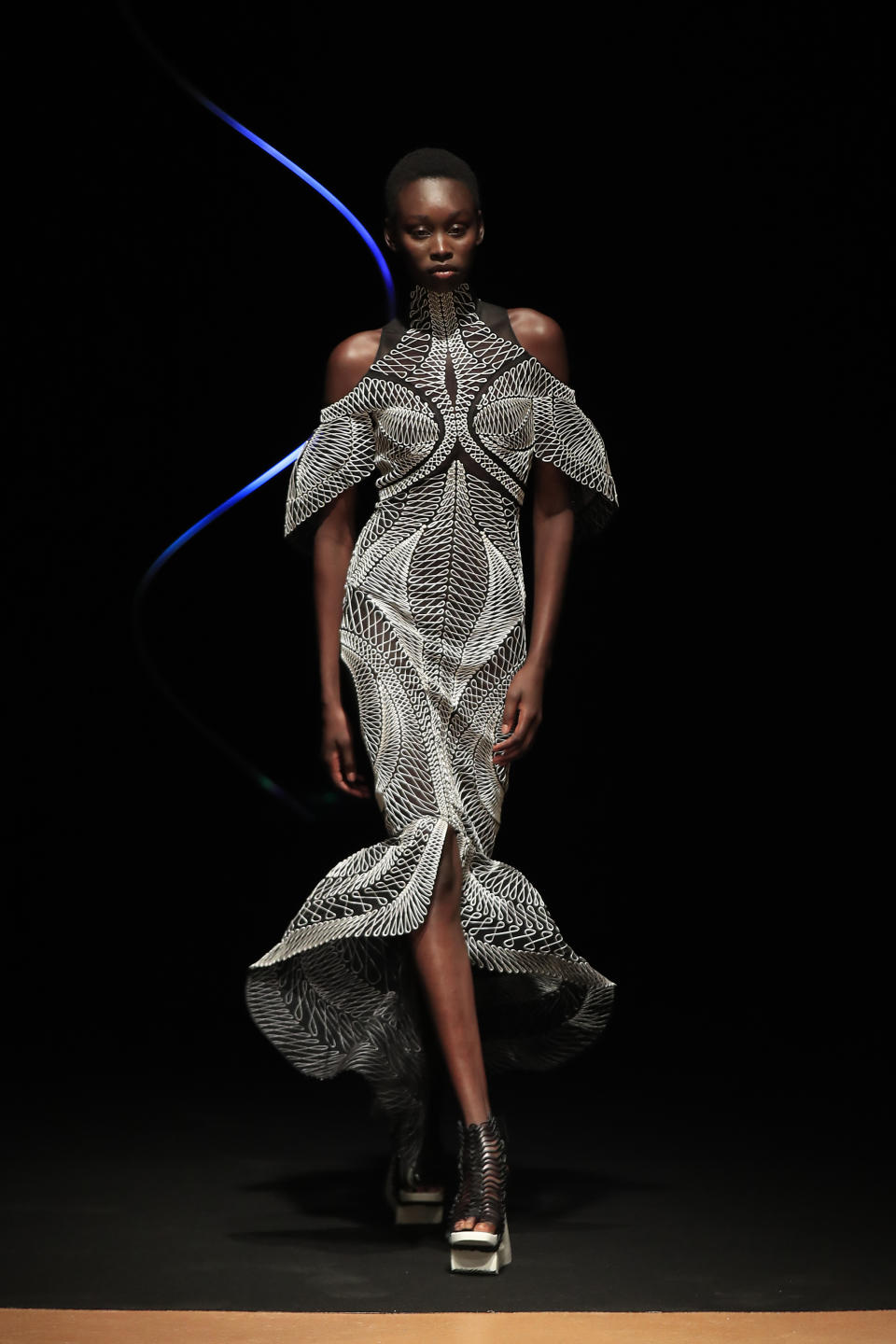 A model wears a creation for Iris van Herpen Haute Couture Spring/Summer 2020 fashion collection presented Monday Jan.20, 2020 in Paris (AP Photo/Michel Euler)