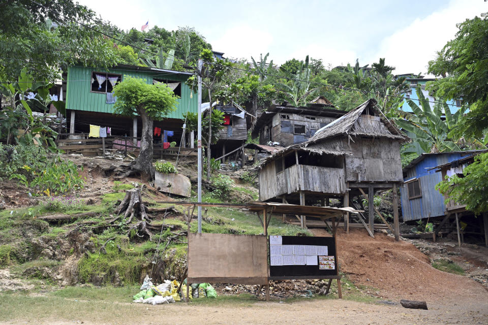 Dwellings are perched at the informal settlement of Koa Hill in Honiara, Solomon Islands, Sunday, April 14, 2024. The country in which China has gained most influence in the South Pacific, Solomon Islands, goes to the polls on Wednesday in an election that could shape the region's future. (Mick Tsikas/AAP Image via AP)