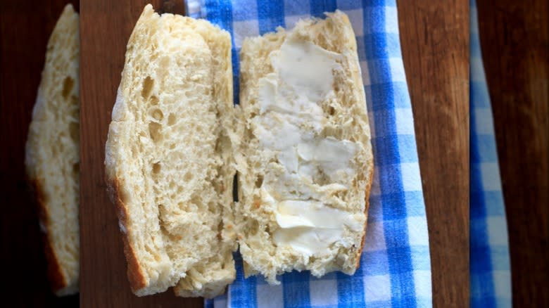 Butter spread on baguette