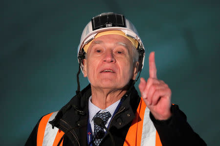 Vinci Chairman and Chief Executive Officer Xavier Huillard delivers his New Year wishes on the site of the future metro stations "Aime Cesaire" and "Mairie d'Aubervilliers" as part of the line 12 extension in Aubervilliers near Paris, France, January 16, 2018. REUTERS/Charles Platiau