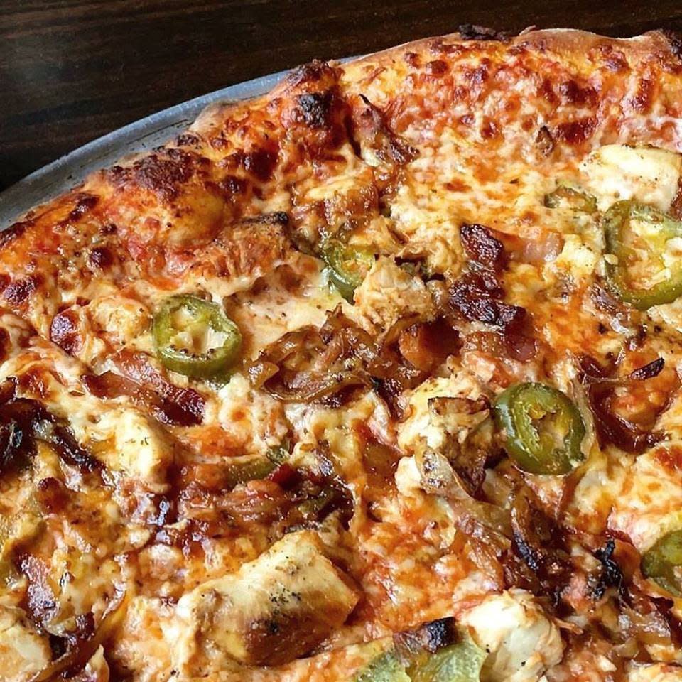 chicken, bacon, jalapeno, and honey mustard pizza at Manhattan Pizza & Pub in Burlington, Vermont