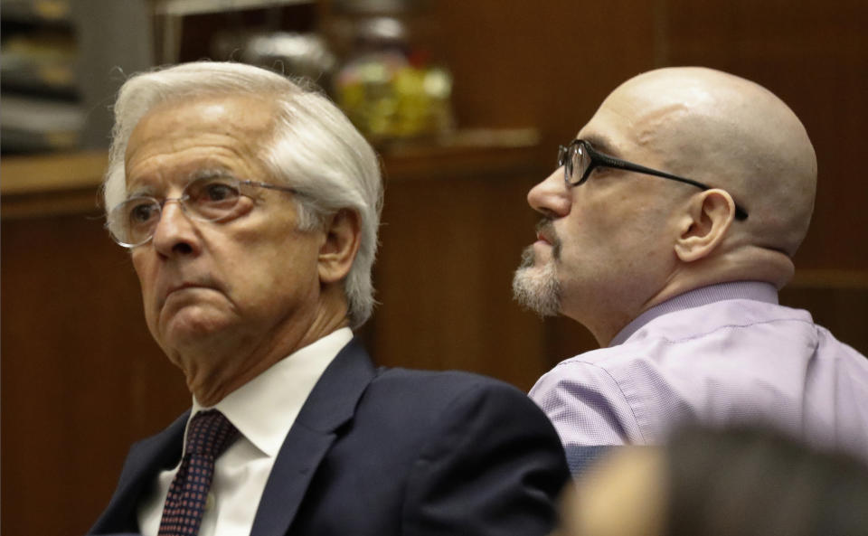 FILE - In this May 2, 2019 file photo Michael Gargiulo, right, appears with his defense attorney Daniel Nardoni in Los Angeles Superior Court for opening statements on his trial on murder charges in Los Angeles. Jurors have reached a verdict Thursday, Aug. 15, in the case of Gargiulo who is charged with fatally stabbing two women in their Southern California homes and attempting to kill a third. (Al Seib/Los Angeles Times via AP, Pool, File)