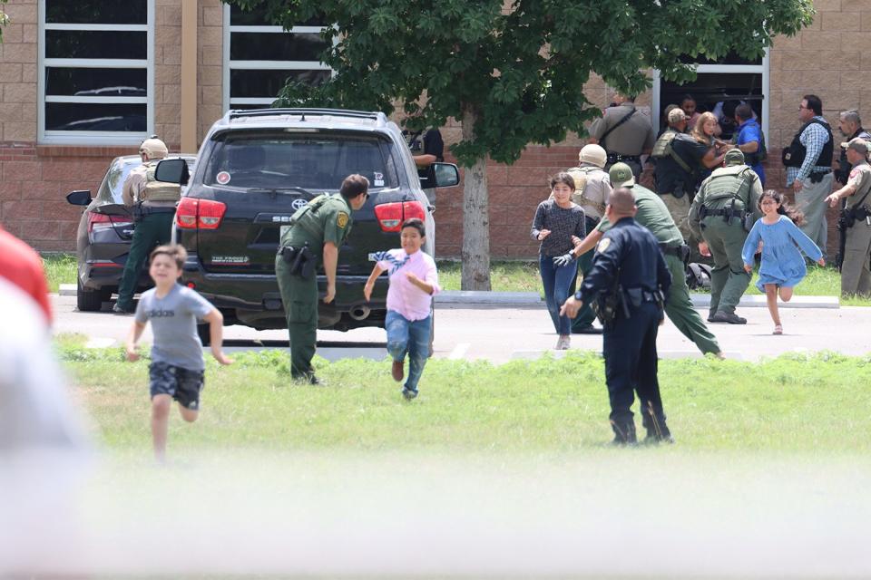 Uvalde, TX May 24, 2022 Shooting at Robb Elementary School kills 19 students and 2 teachers. Early stages outside the school. Credit: Uvalde Leader News free of charge.  Contact: Meghann Garcia: mgarcia@ulnnow.com 830 278 3335