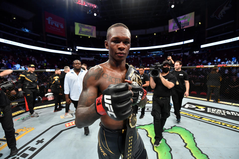 Israel Adesanya (pictured) reacts after defeating Marvin Vettori in their middleweight championship.