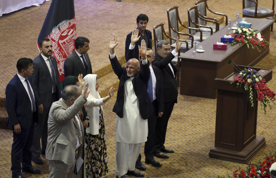 Afghan presidential candidate Ashraf Ghani, center, greets his supporters during the first day of campaigning in Kabul, Afghanistan, Sunday, July 28, 2019. Sunday marked the first day of campaigning for presidential elections scheduled for Sept. 28. President Ghani is seeking a second term on promises of ending the 18-year war but has been largely sidelined over the past year as the U.S. has negotiated directly with the Taliban. (AP Photo/Rahmat Gul)