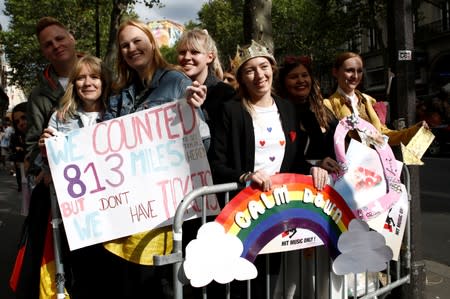 Fans of Taylor Swift wait outside the Olympia Theatre prior to her concert performance in Paris