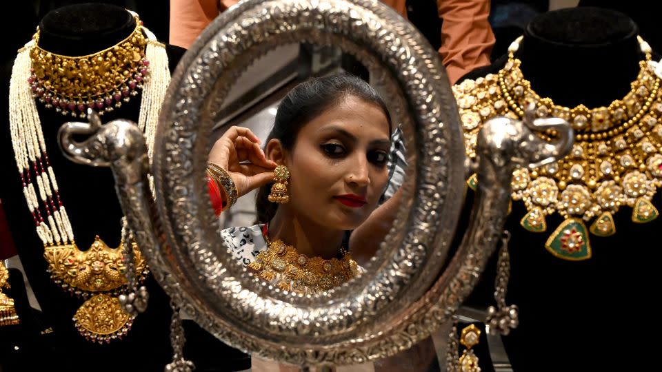 On Dhanteras, the first day of Diwali, some people buy gold and silver jewelry for good luck and prosperity. - Narinder Nanu/AFP/Getty Images