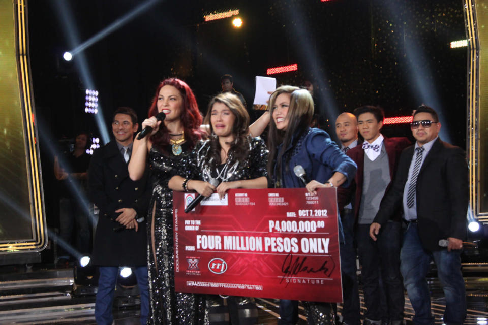 KZ accepts her P4 million prize