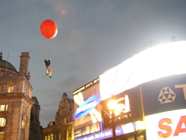 Banksy transformed a helium-filled sex doll into a child being carried into the sky by a gigantic McDonald&rsquo;s-branded balloon for the piece. (Photo: Steve Lazarides)