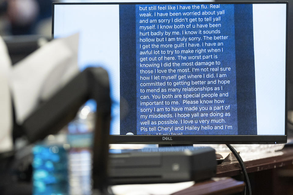 A text message from Alex Murdaugh is shown during his double murder trial at the Colleton County Courthouse on Wednesday, Feb. 8, 2023, in Walterboro, S.C. The 54-year-old attorney is standing trial on two counts of murder in the shootings of his wife and son at their Colleton County home and hunting lodge on June 7, 2021. (Joshua Boucher/The State via AP, Pool)