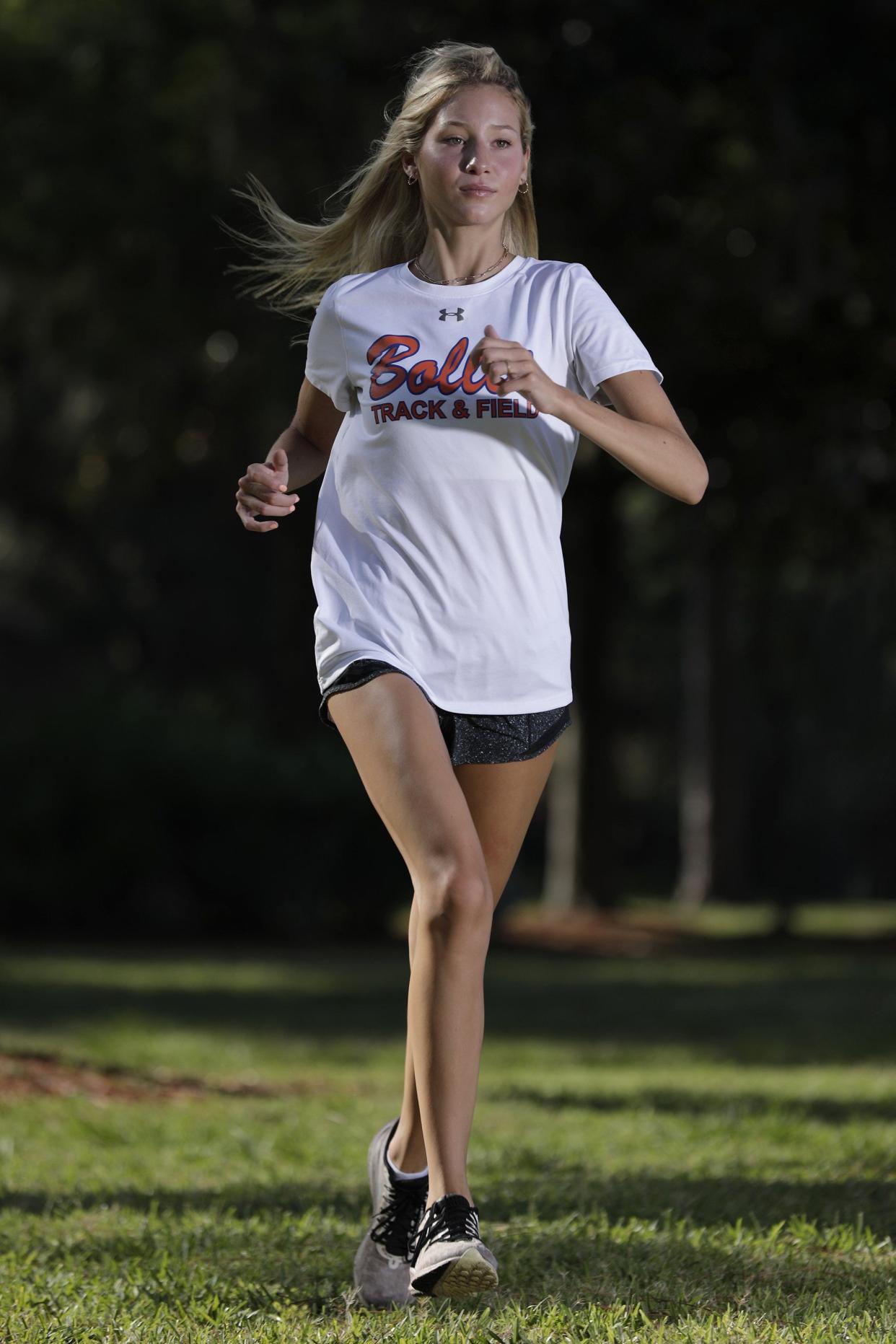 Bolles senior Jillian Candelino set the school record in girls cross country at the Alexander/Asics Invitational in Georgia.