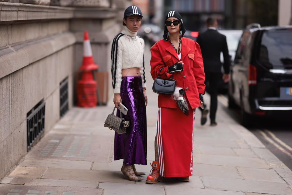 LONDON, ENGLAND - SEPTEMBER 1: Sammy Ma and Fiona Kim seen wearing a sporty look by adidas x gucci, outside simone rocha during London Fashion Week September 2022 on September 18, 2022 in London, England. (Photo by Jeremy Moeller/Getty Images)