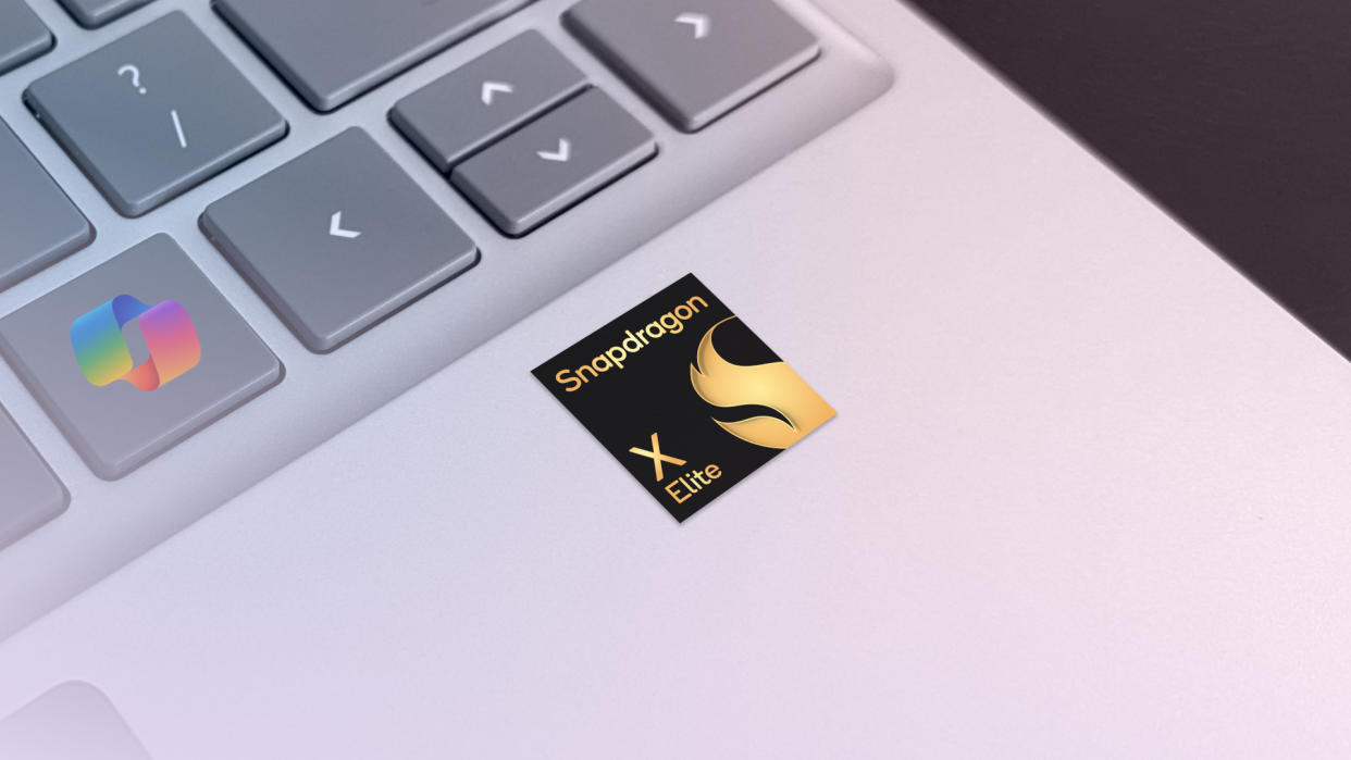  Qualcomm Snapdragon X Elite sticker on a Microsoft Surface Laptop deck with Copilot key. 