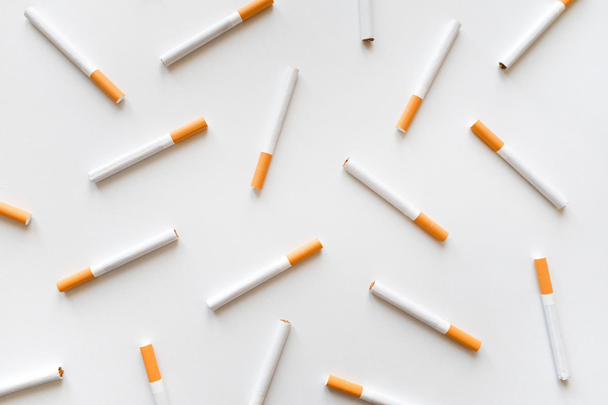 Filtered cigarettes spread out in various positions. 