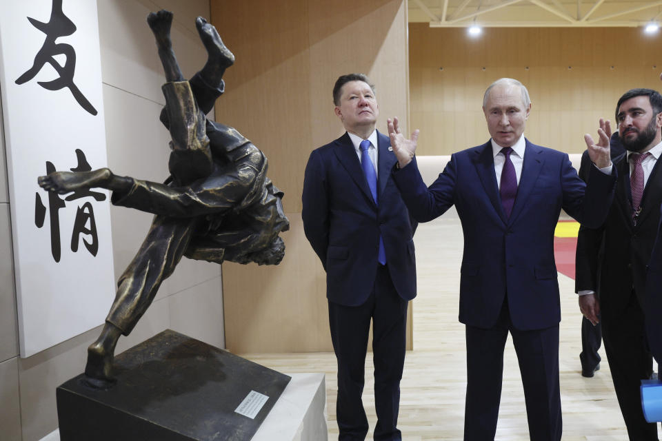 2023 Russian President Vladimir Putin, accompanied by Gazprom CEO Alexei Miller, left, visits a martial arts academy at Sirius Park in the resort city of Sochi, Russia, Friday, June 9, 2023. (Gavriil Grigorov, Sputnik, Kremlin Pool Photo via AP)