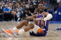 Phoenix Suns guard Chris Paul (3) argues a call during the first half of Game 3 of an NBA basketball second-round playoff series against the Dallas Mavericks, Friday, May 6, 2022, in Dallas. (AP Photo/Tony Gutierrez)