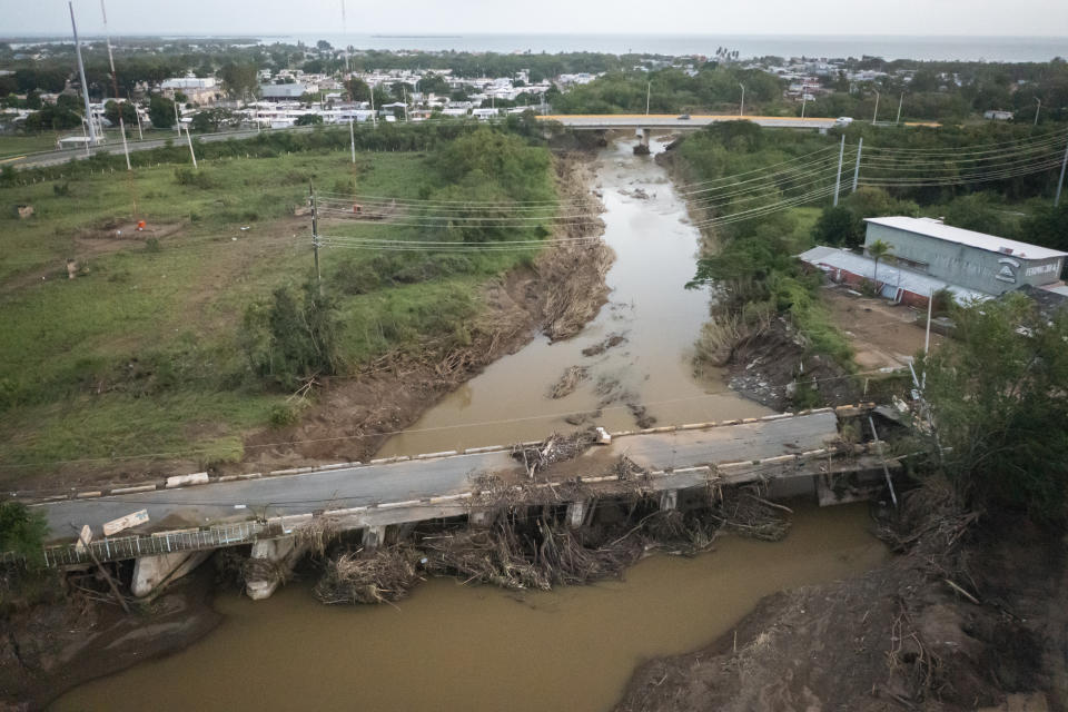 View of a damaged bridge after Hurricane Fiona hit Villa Esperanza in Salinas, Puerto Rico, Wednesday, September 21, 2022. (AP Photo/Alejandro Granadillo)