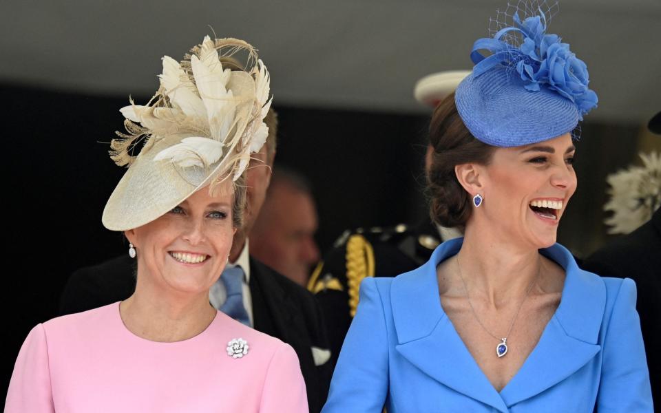 Britain's Catherine, Duchess of Cambridge and Sophie, Countess of Wessex attend the Order of the Garter Service at St. Georges's Chapel on Monday - TOBY MELVILLE 